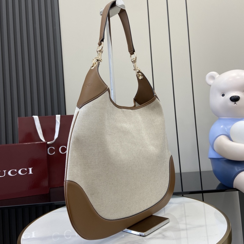 Сумка Gucci из канвы с кожаной отделкой