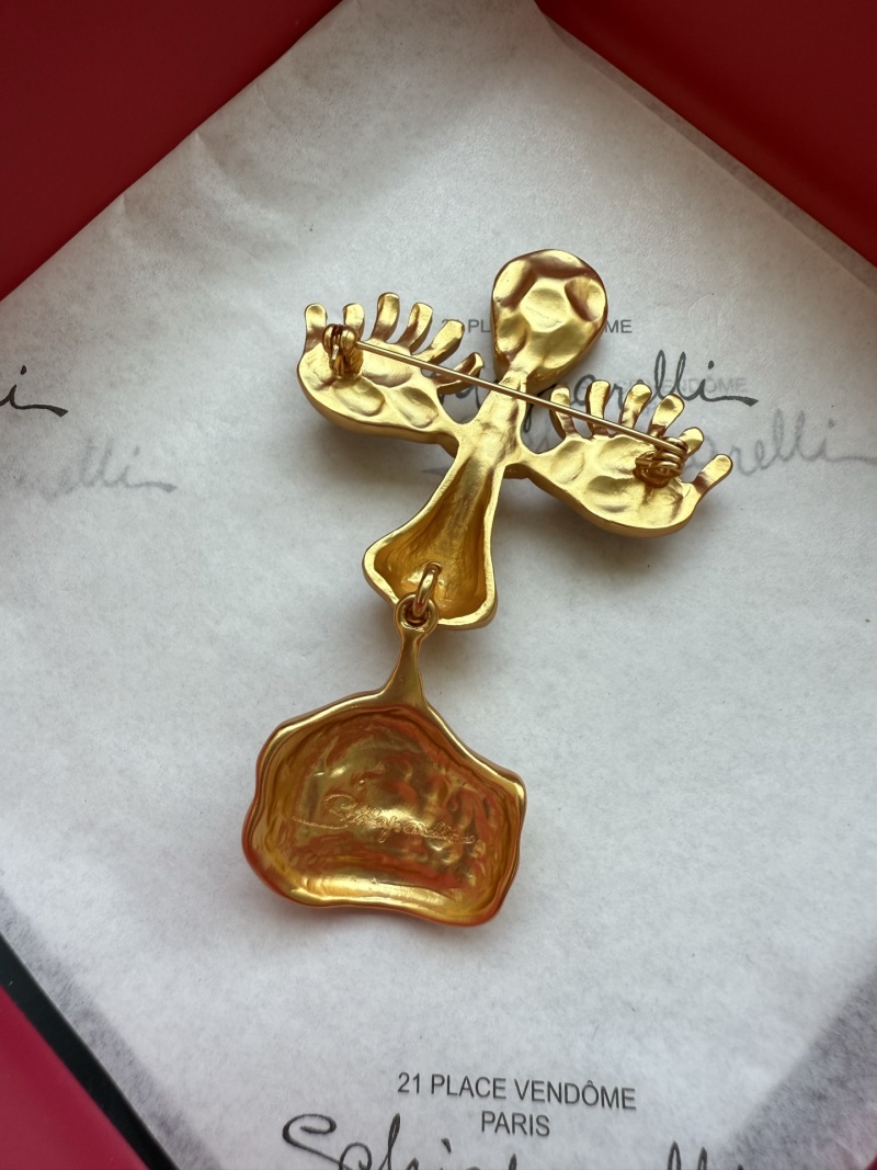Брошь Schiaparelli