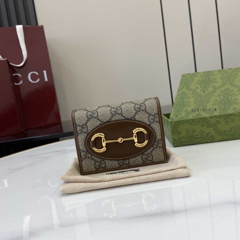 Кошелек Gucci с принтом GG и фурнитурой