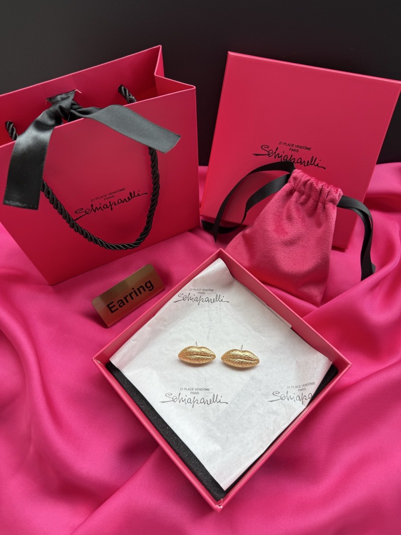 Золотистые серьги в виде губ Schiaparelli