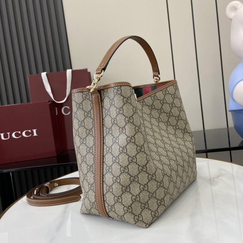 Сумка Gucci с монограммой и кожаной отделкой