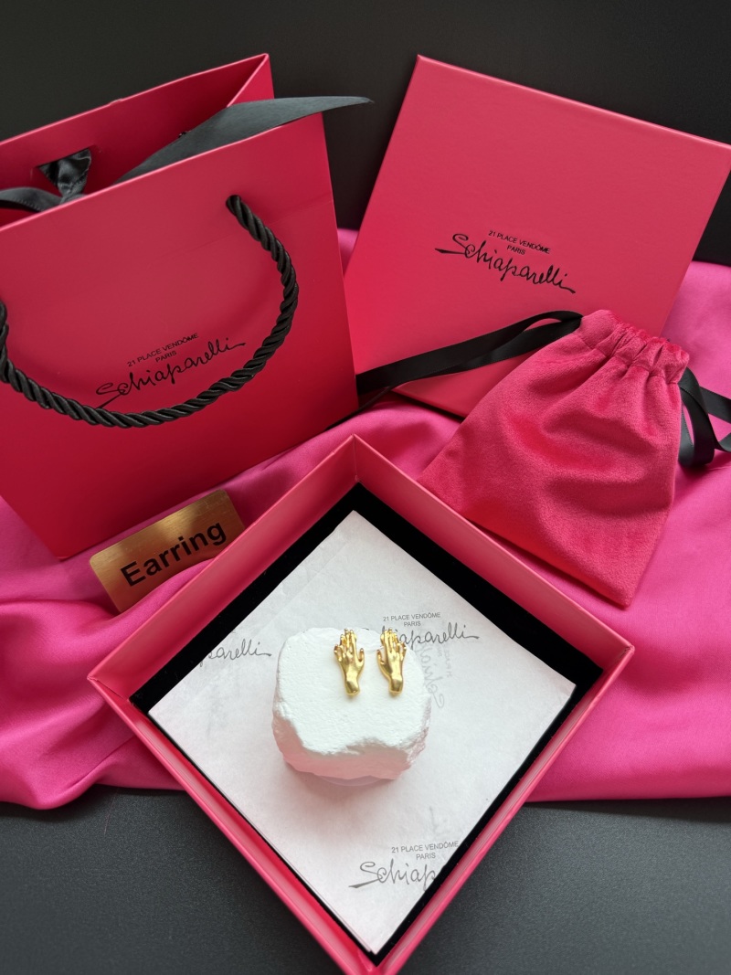 Серьги в виде рук Schiaparelli