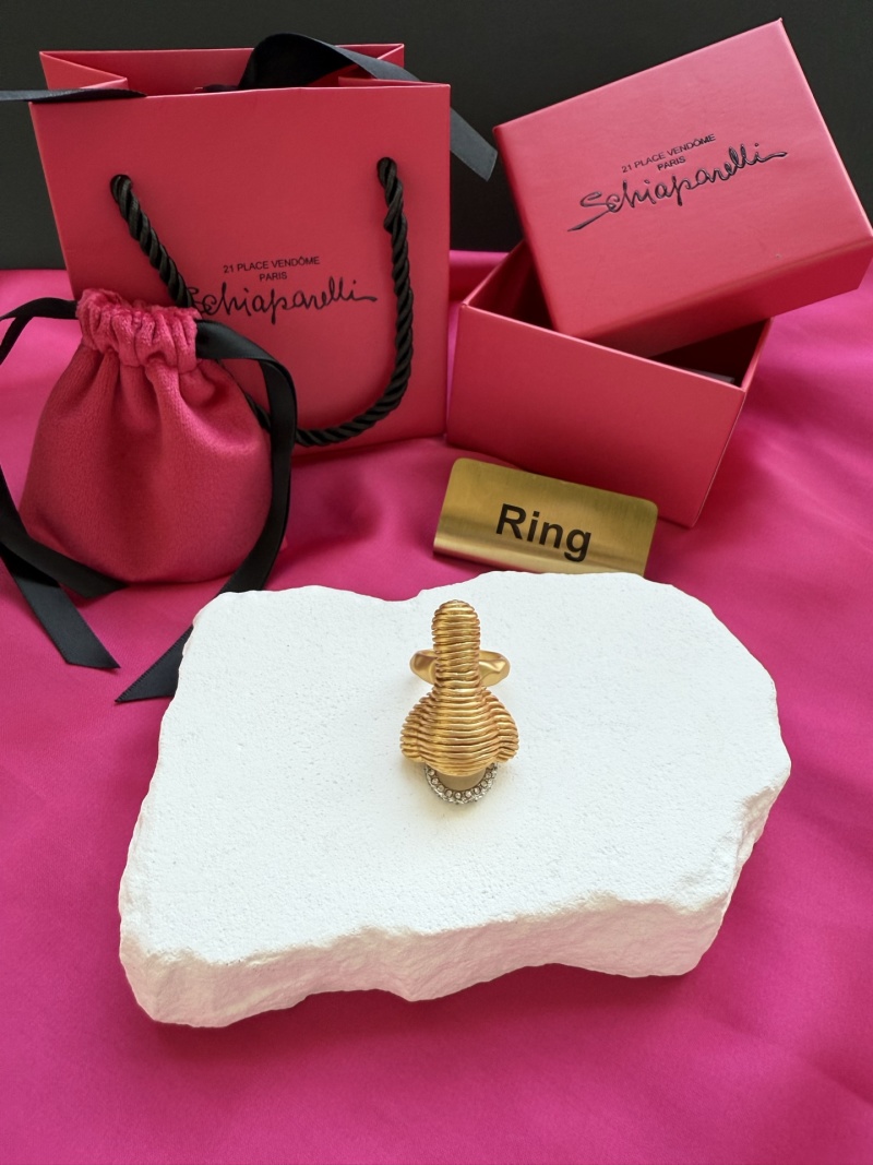 Золотистое кольцо с кристаллами Schiaparelli