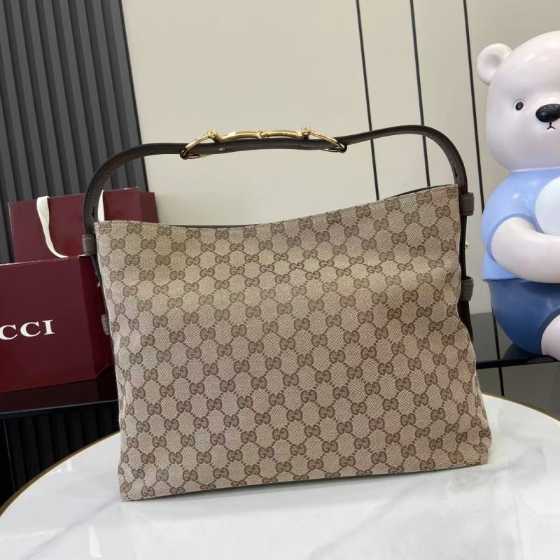 Сумка Gucci с монограммой и ручкой