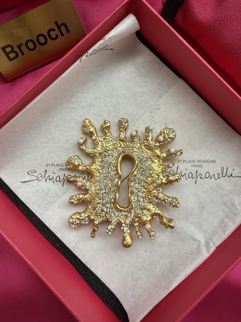 Брошь Schiaparelli