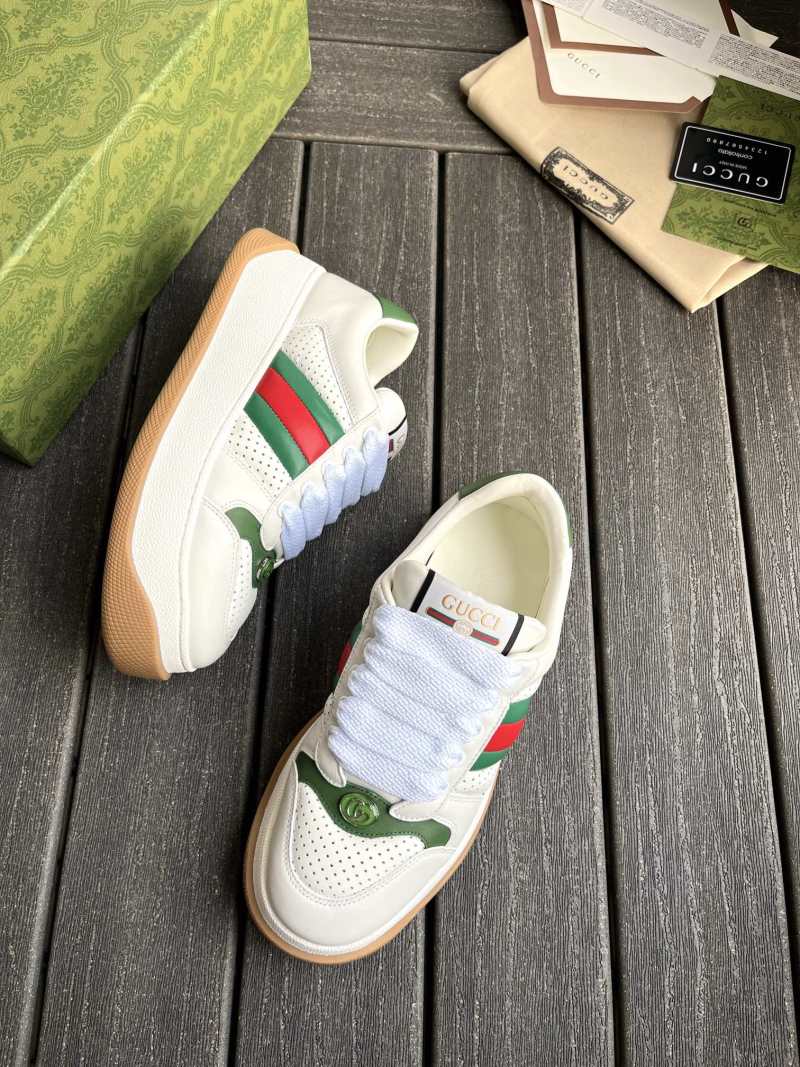 Кроссовки белые на массивной подошве с красно-зелеными деталями Gucci