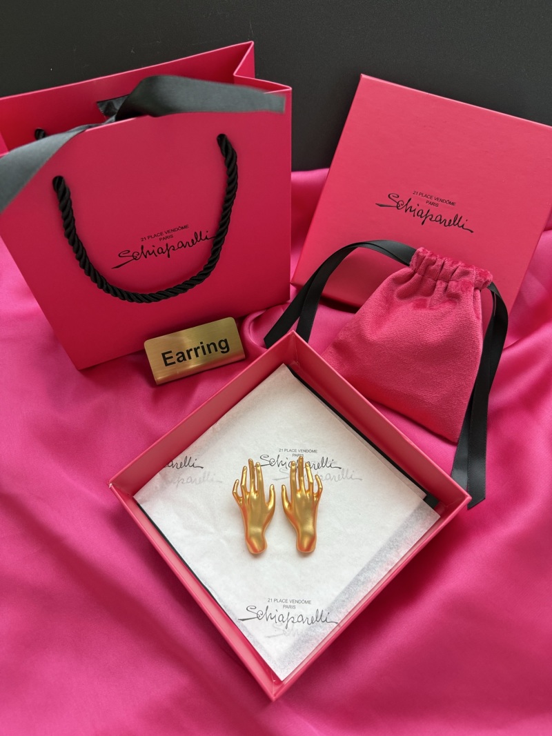 Серьги в виде рук Schiaparelli