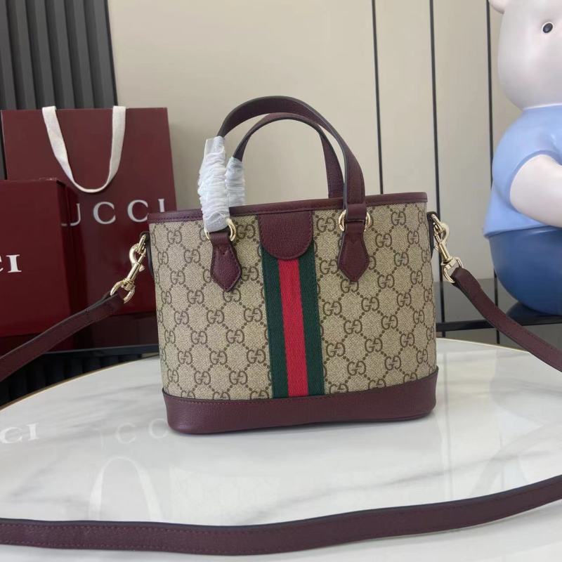 Сумка Gucci с монограммой и кожаной отделкой