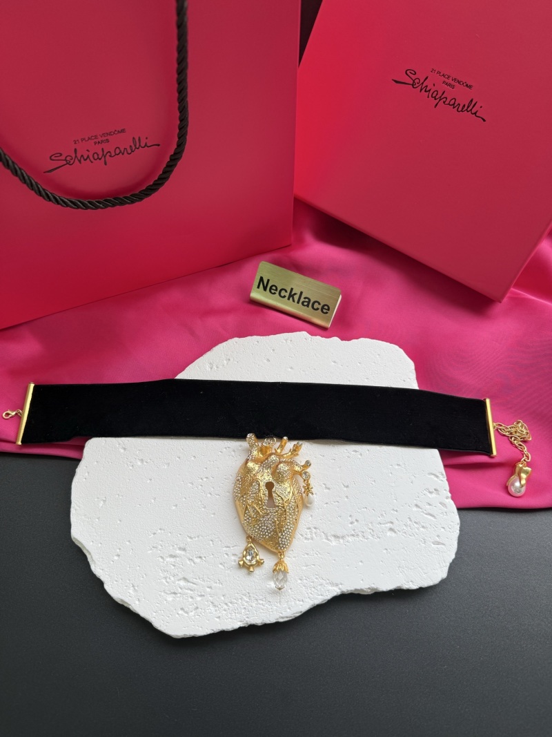 Колье в виде сердца с ключом Schiaparelli