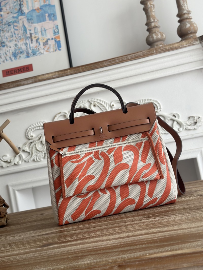 Сумка из ткани с кожаным декором и металлическим замком Hermès