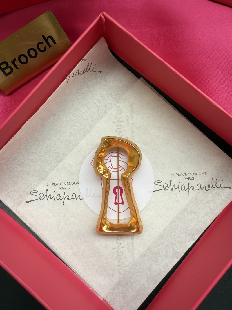 Брошь в форме ключа Schiaparelli