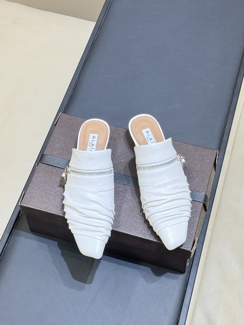 Белые мюли Alaïa с металлическим замком