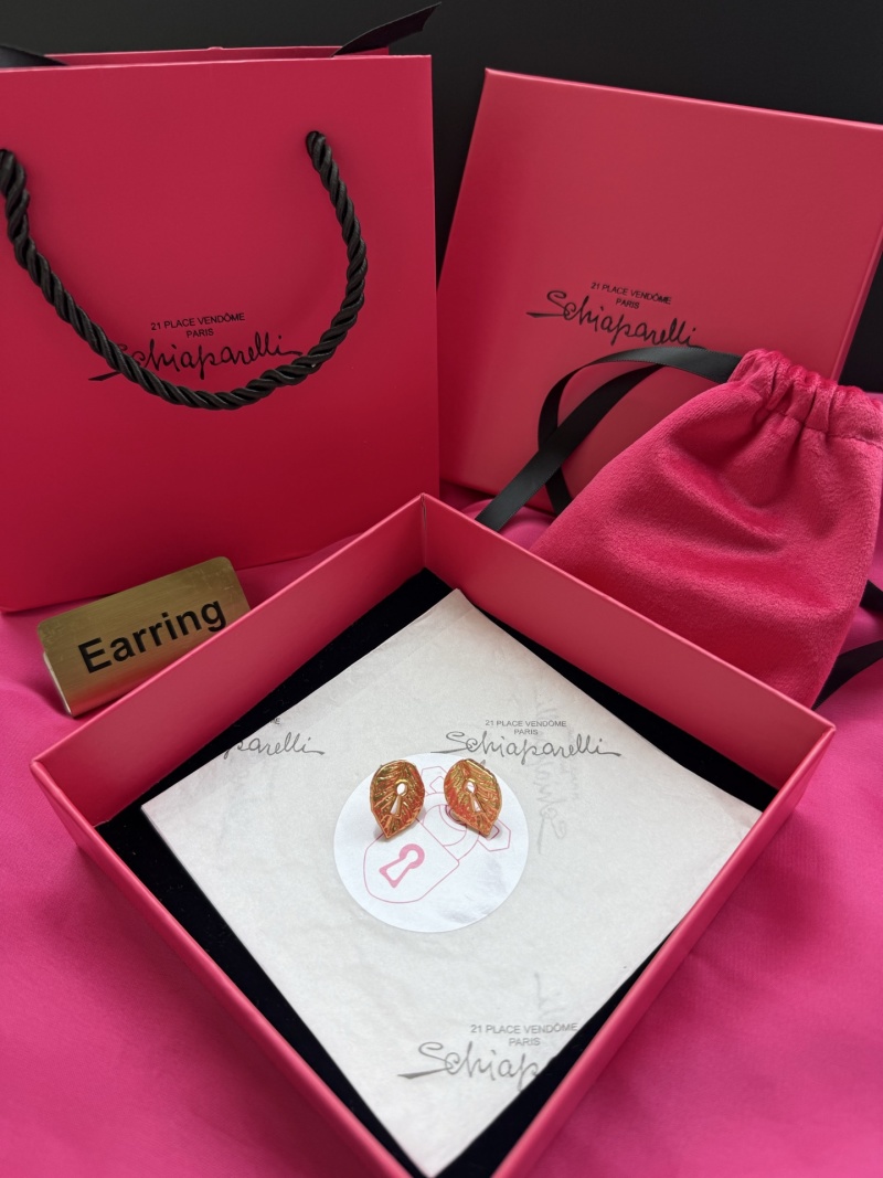 Серьги в форме листа с отверстием в виде ключа Schiaparelli