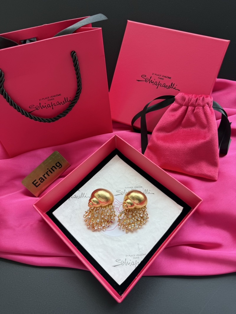 Серьги Schiaparelli в форме улитки с кристаллами