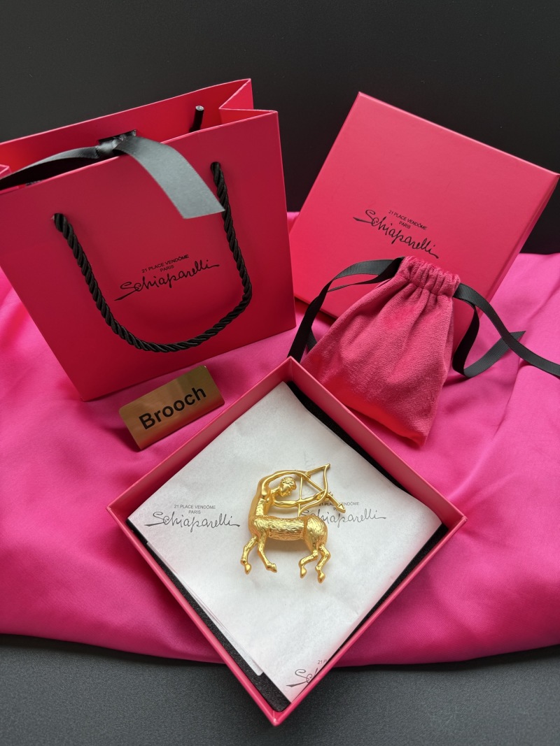 Брошь в виде зодиакального знака Стрелец Schiaparelli