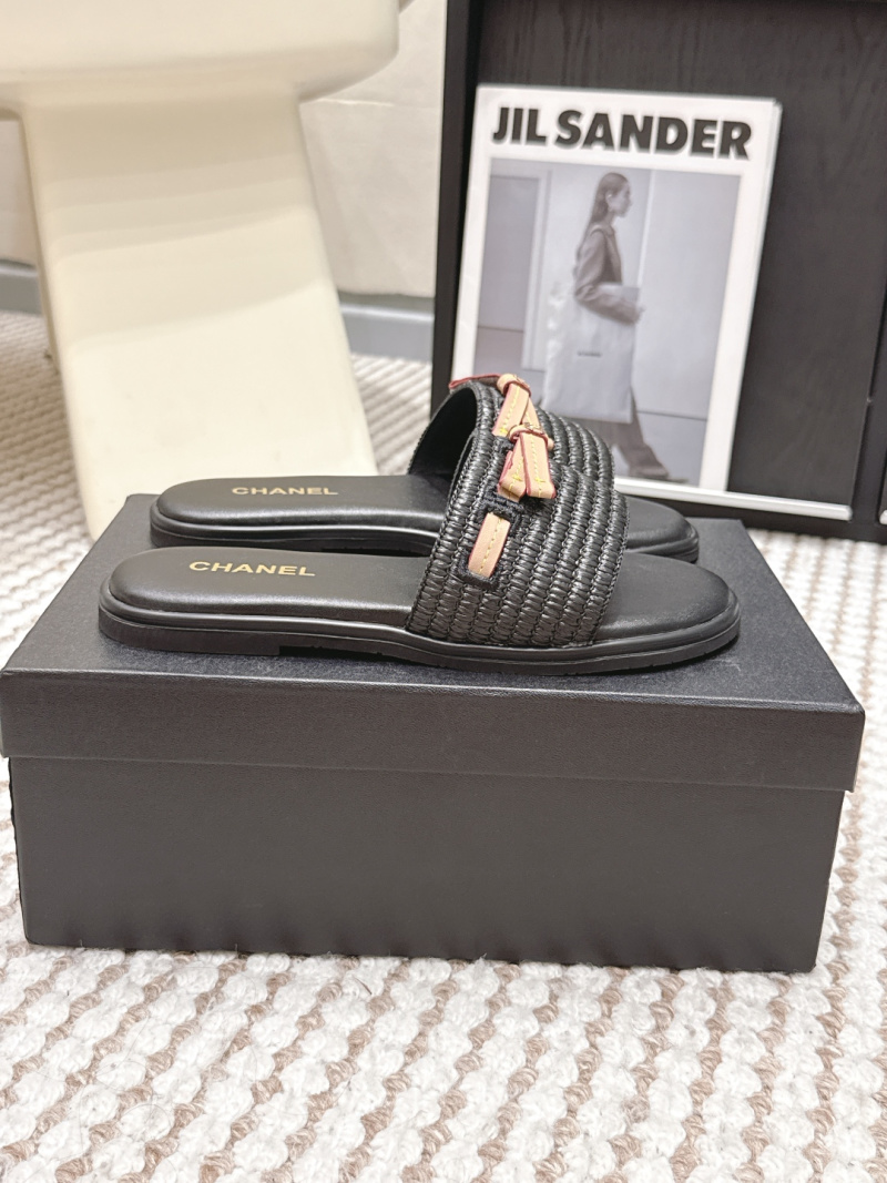 Черные плетеные шлепанцы Chanel с бантом