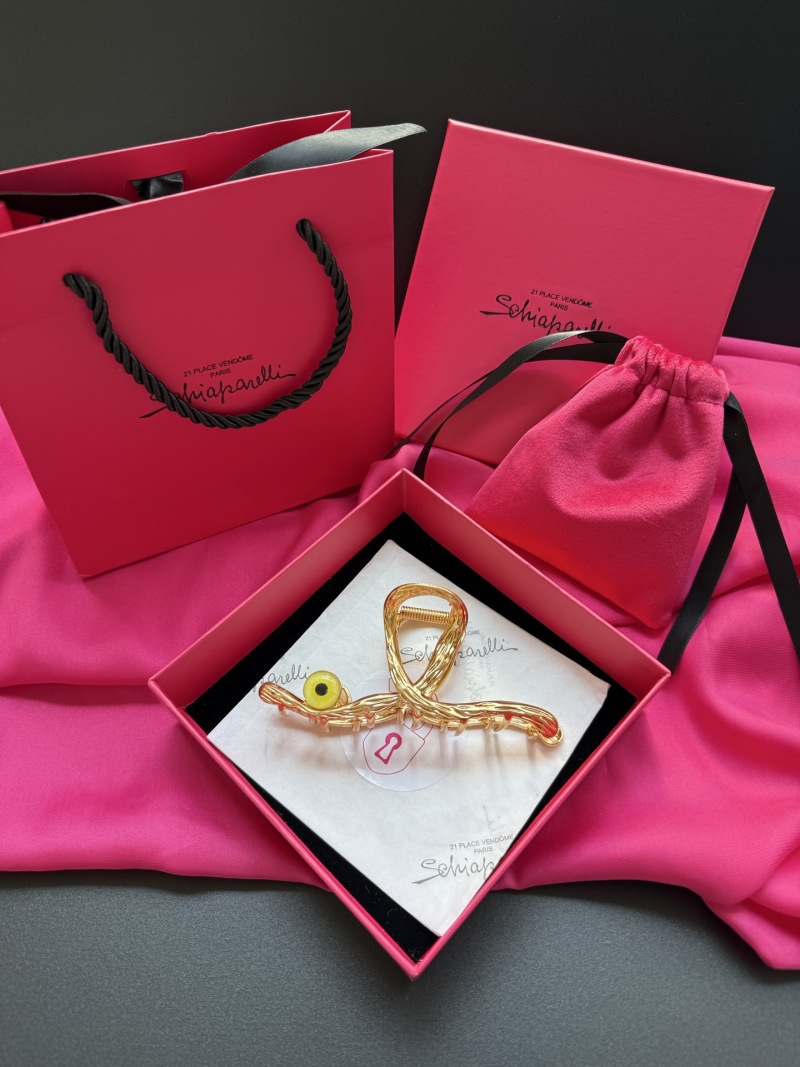 Брошь Schiaparelli с глазом