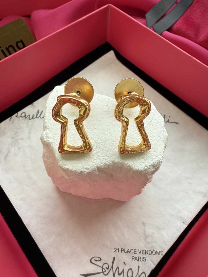 Серьги в форме ключа Schiaparelli