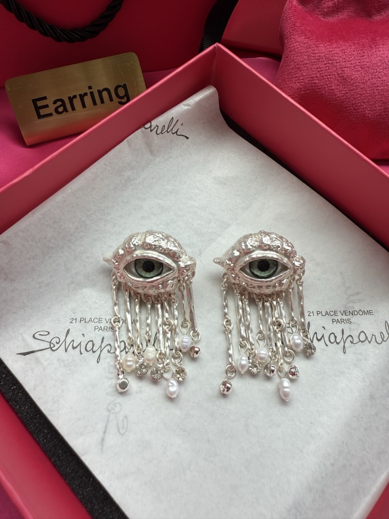 Серьги с глазом и кисточками Schiaparelli