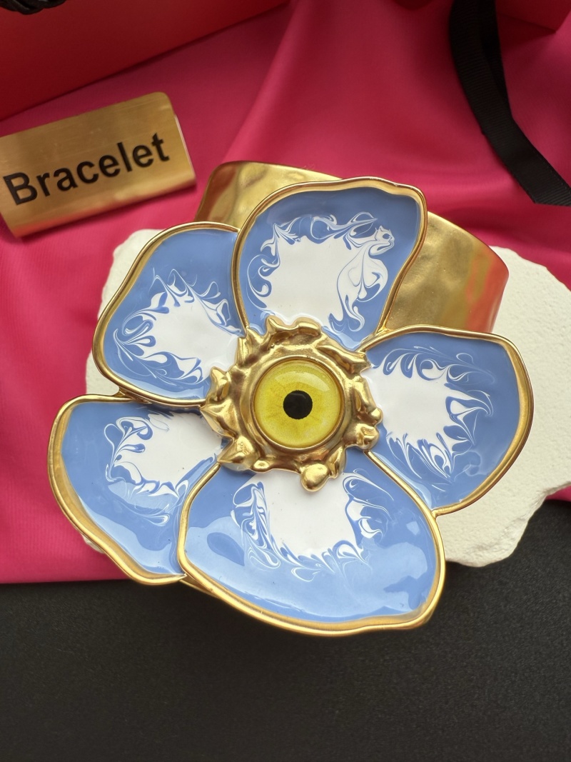 Браслет в виде цветка с глазом Schiaparelli
