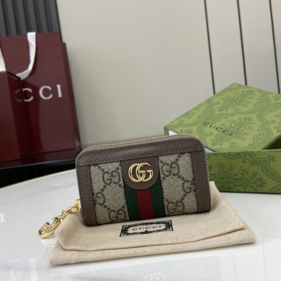 Кошелёк Gucci с монограммой и замком