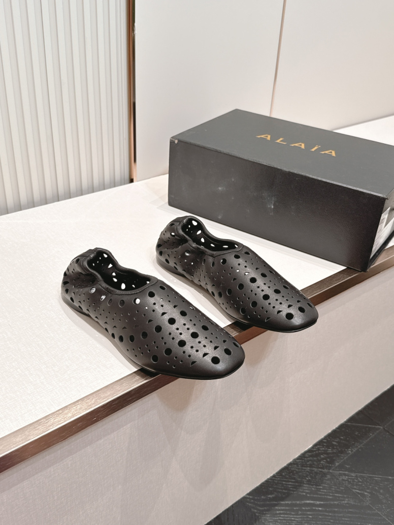 Черные кожаные балетки Alaïa с перфорацией