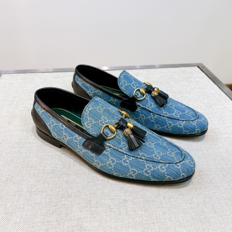 Мужские лоферы с узором GG и металлическими элементами Gucci