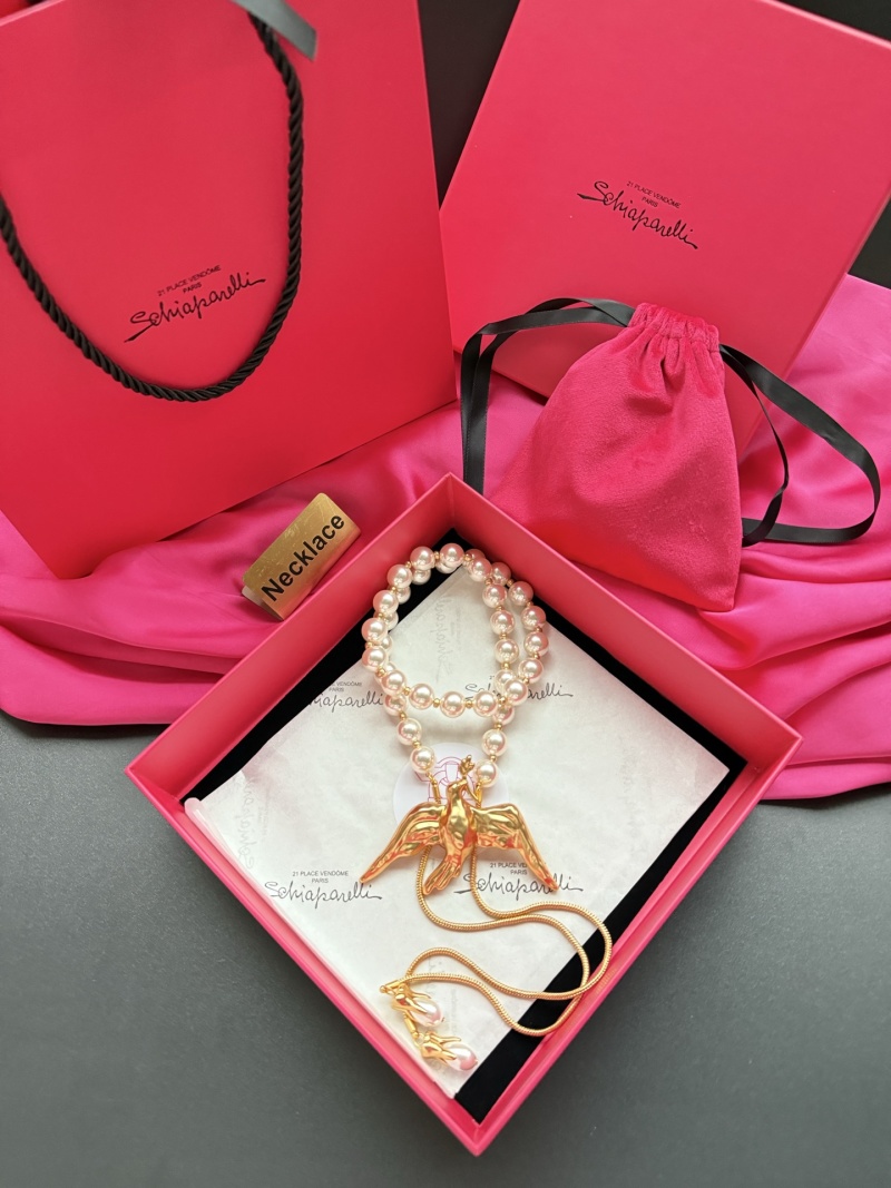 Набор из бус и колье с птицей Schiaparelli