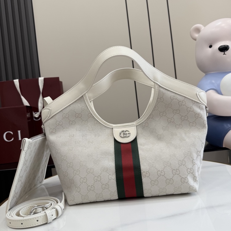 Сумка Gucci с монограммой и ремешком