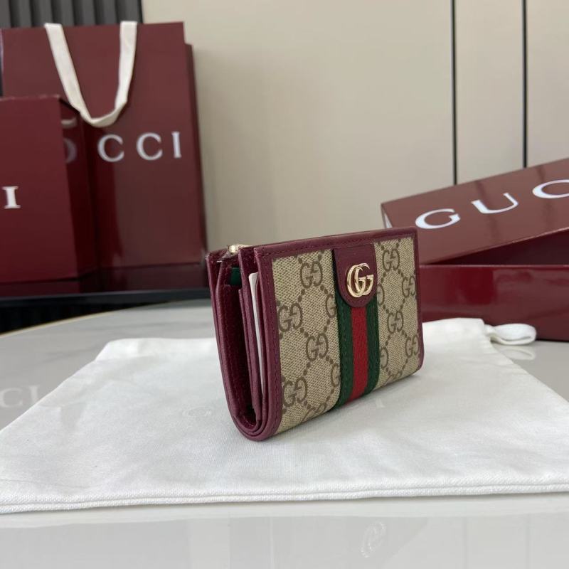 Кошелёк Gucci с монограммой и молнией