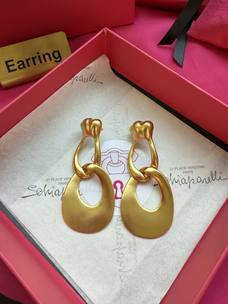 Золотистые серьги-кольца с гладкой поверхностью Schiaparelli
