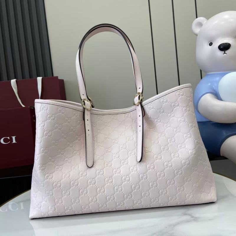 Сумка-тоут Gucci с тиснением GG