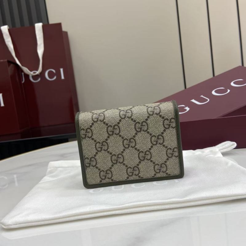 Портмоне Gucci с монограммой и кожаной вставкой