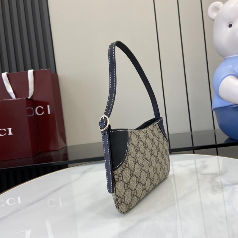 Сумка Gucci с монограммой и кожаной отделкой