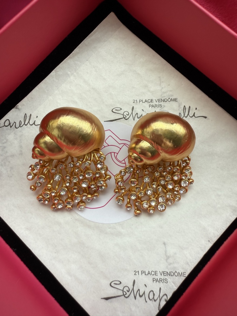 Серьги Schiaparelli в форме улитки с кристаллами