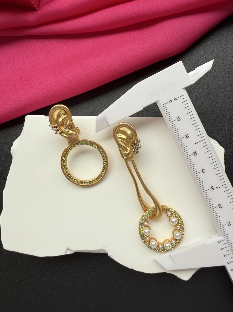 Серьги Schiaparelli