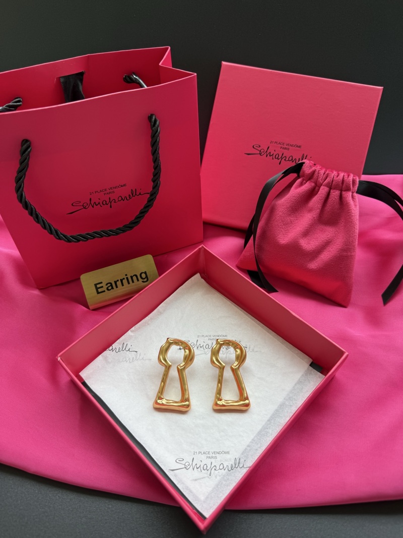 Серьги в форме ключа Schiaparelli