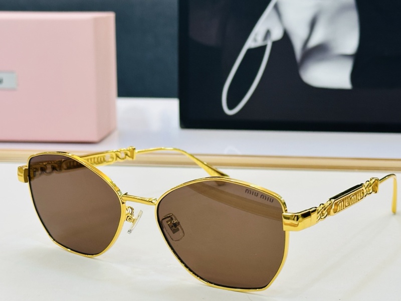 Солнцезащитные очки Miu Miu золотистые
