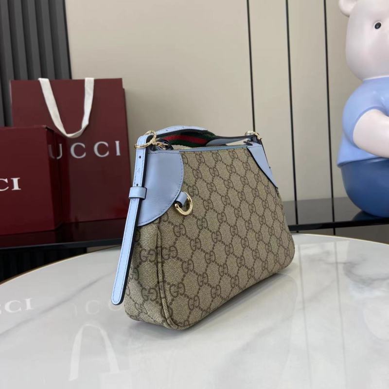 Сумка Gucci с монограммой и голубыми вставками