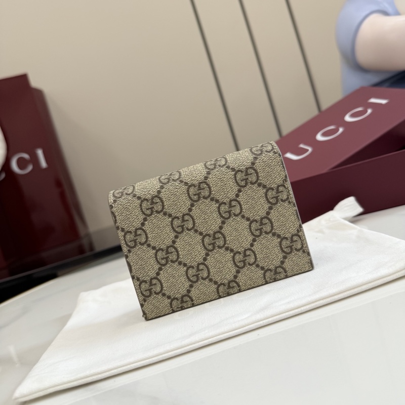 Портмоне Gucci с монограммой и логотипом GG