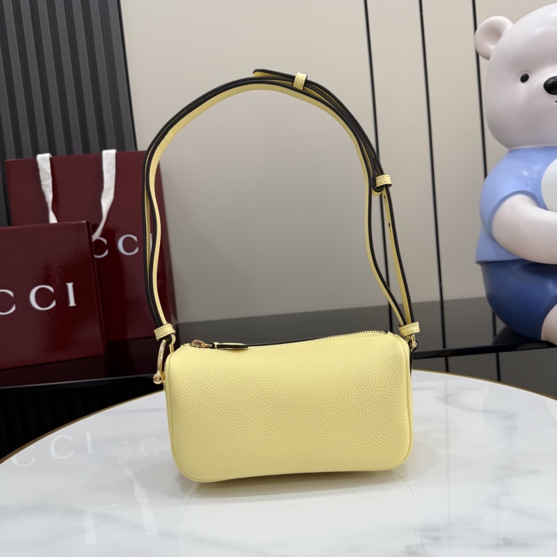Желтая сумка-клатч Gucci с ремешком
