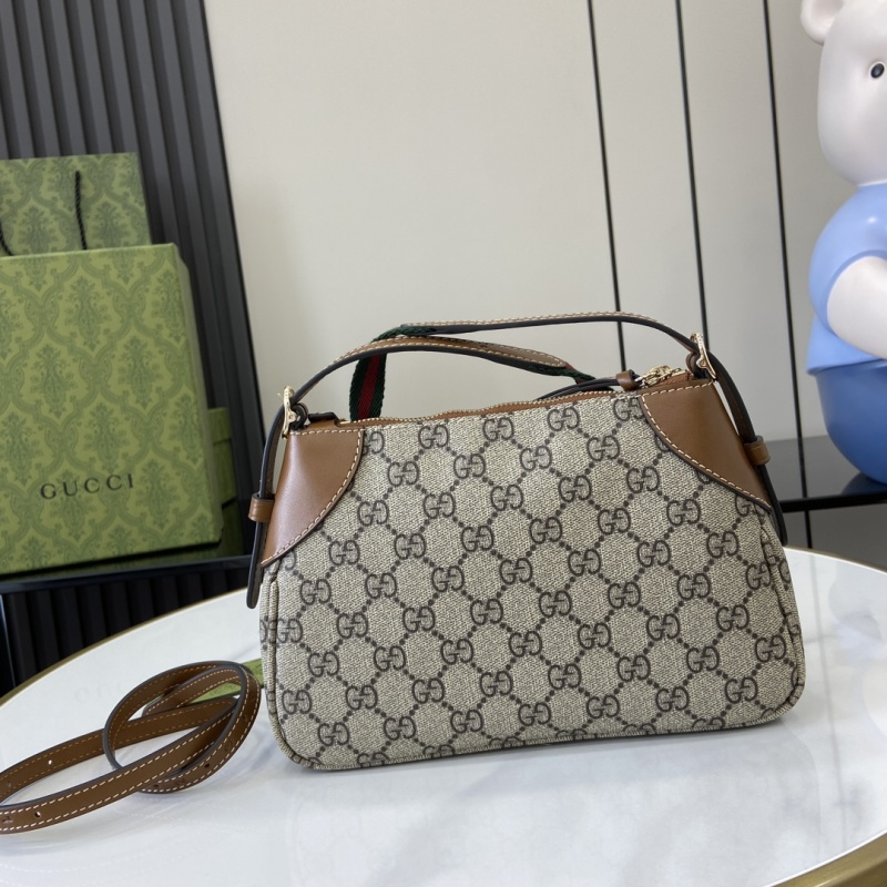 Сумка Gucci с монограммой и кожаной отделкой