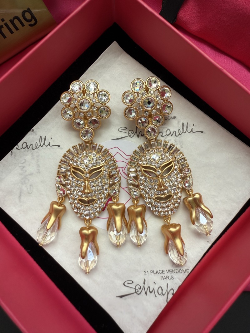 Серьги Schiaparelli с кристаллами и стилизованными зубами