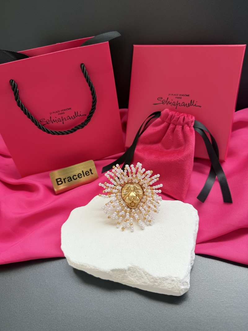 Браслет в виде солнца с лицом и жемчугом Schiaparelli