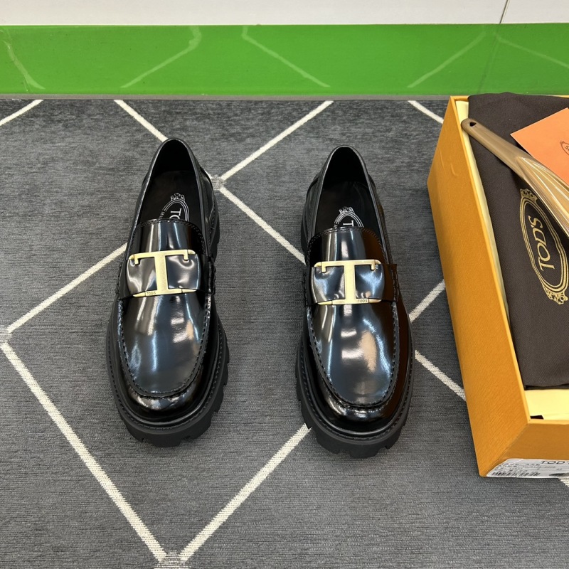 Мужские черные кожаные лоферы с декоративной пряжкой Tod's