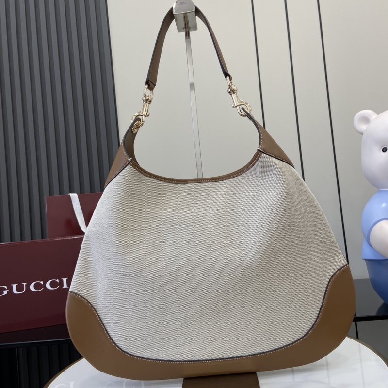 Сумка Gucci из канвы с кожаной отделкой