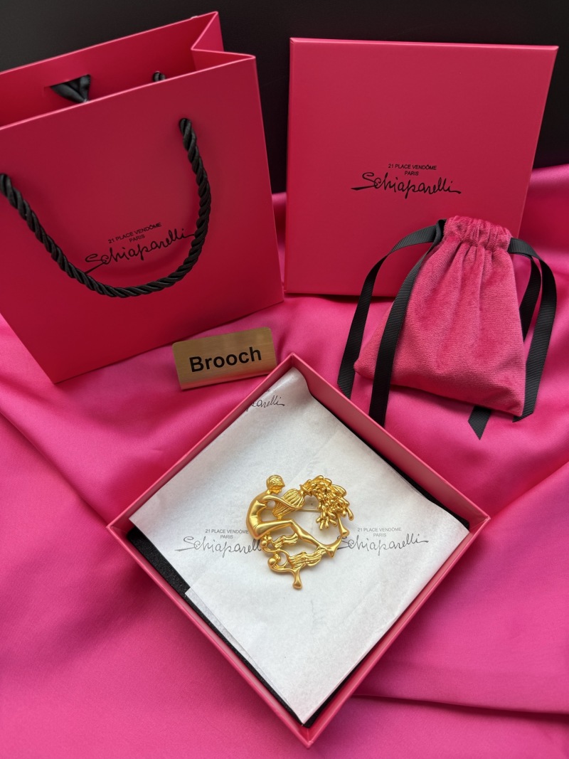 Брошь Schiaparelli