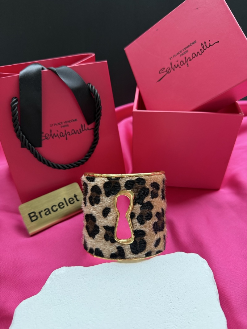 Браслет с леопардовым принтом Schiaparelli
