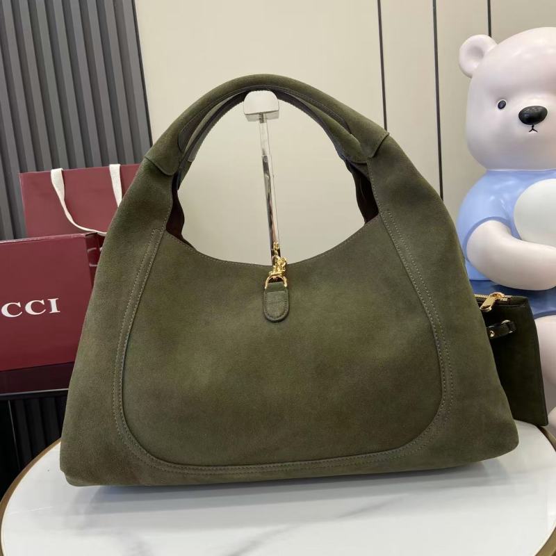 Сумка Gucci из замши с металлической фурнитурой