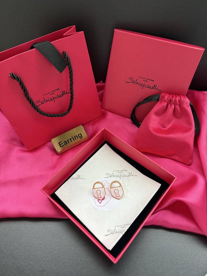 Серьги в форме замка Schiaparelli